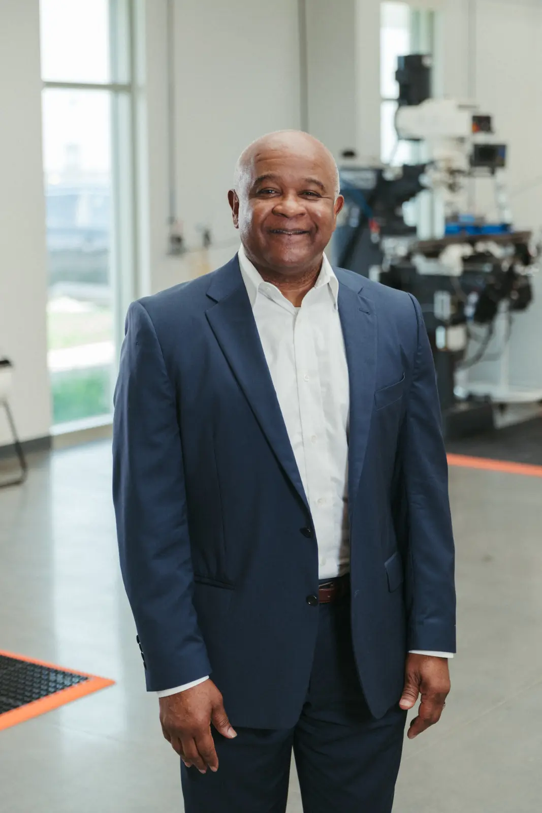 Executive portrait photography by Hylton Media Group on a manufacturing floor
