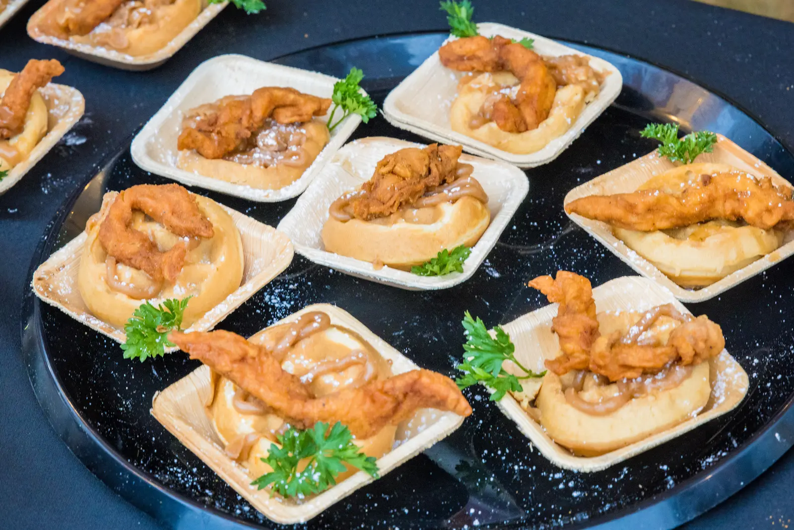 Food photography in Atlanta by Hylton Media Group: plated bites at a festival tasting booth
